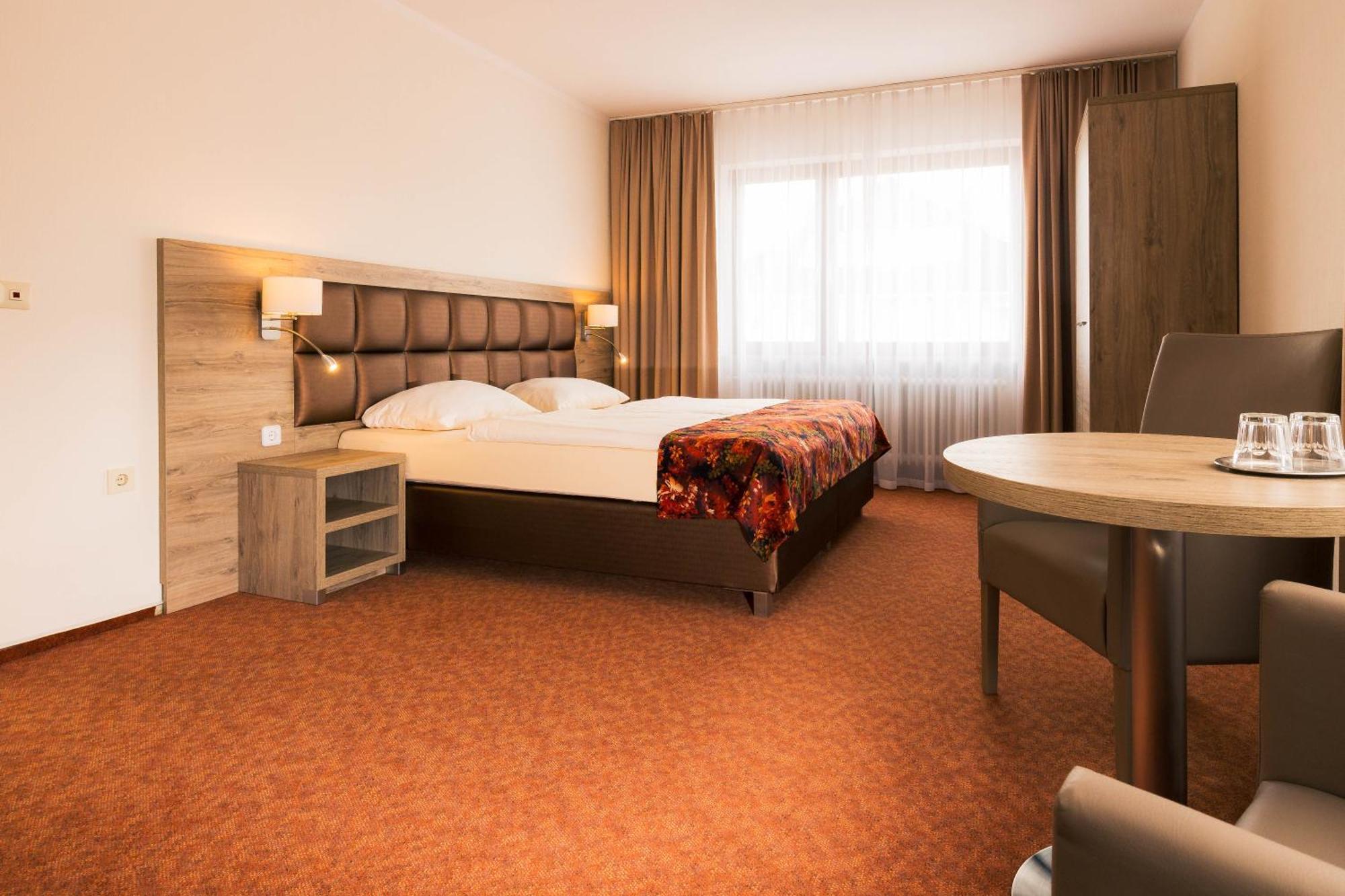 Strand Hotel Nordsee, Hotel Deichlaeufer Tossens Esterno foto